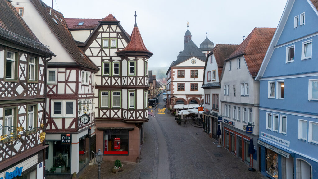 Half-timbered houses lining a quiet street in the old town of Lohr am Main, Lower Franconia, Germany
